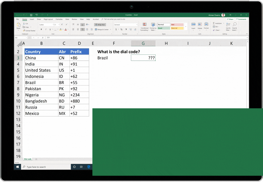 Animated gif showing XLOOKUP being used in Excel on a list of countries and their phone prefix codes.