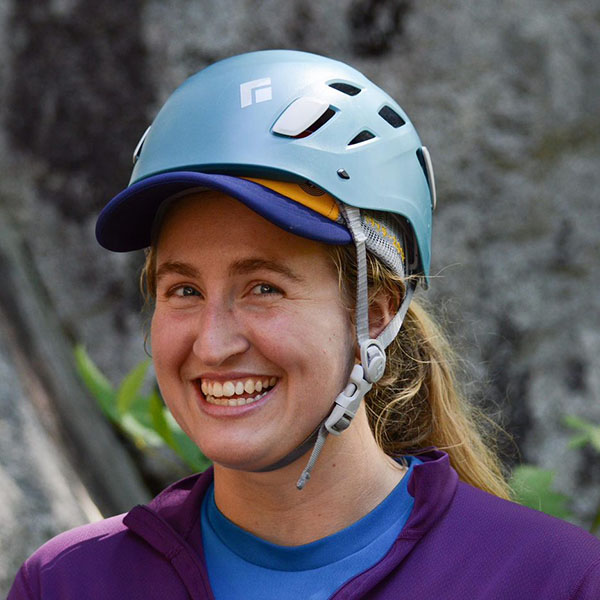 Ali Forelli in a rock-climbing helmet.